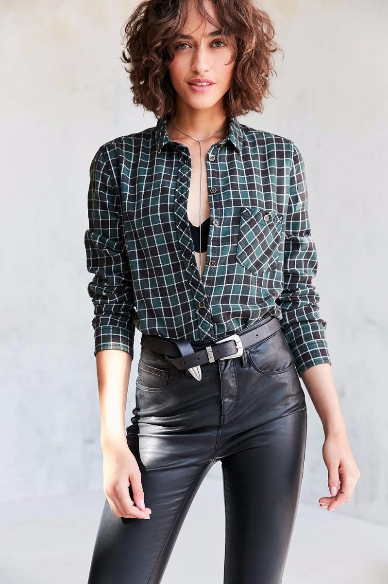 woman in black leather trouser